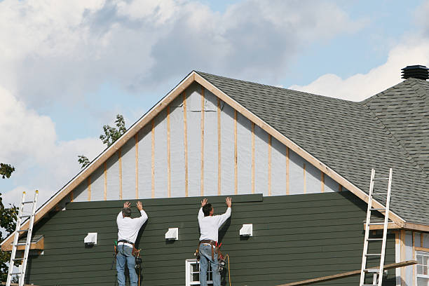 Professional Siding Contractor technician working in West Finley, PA